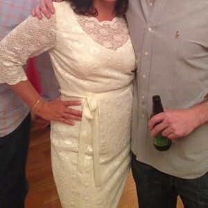 Beautiful slight sparkle cream dress. Size 12. Wore once for wedding rehearsal.